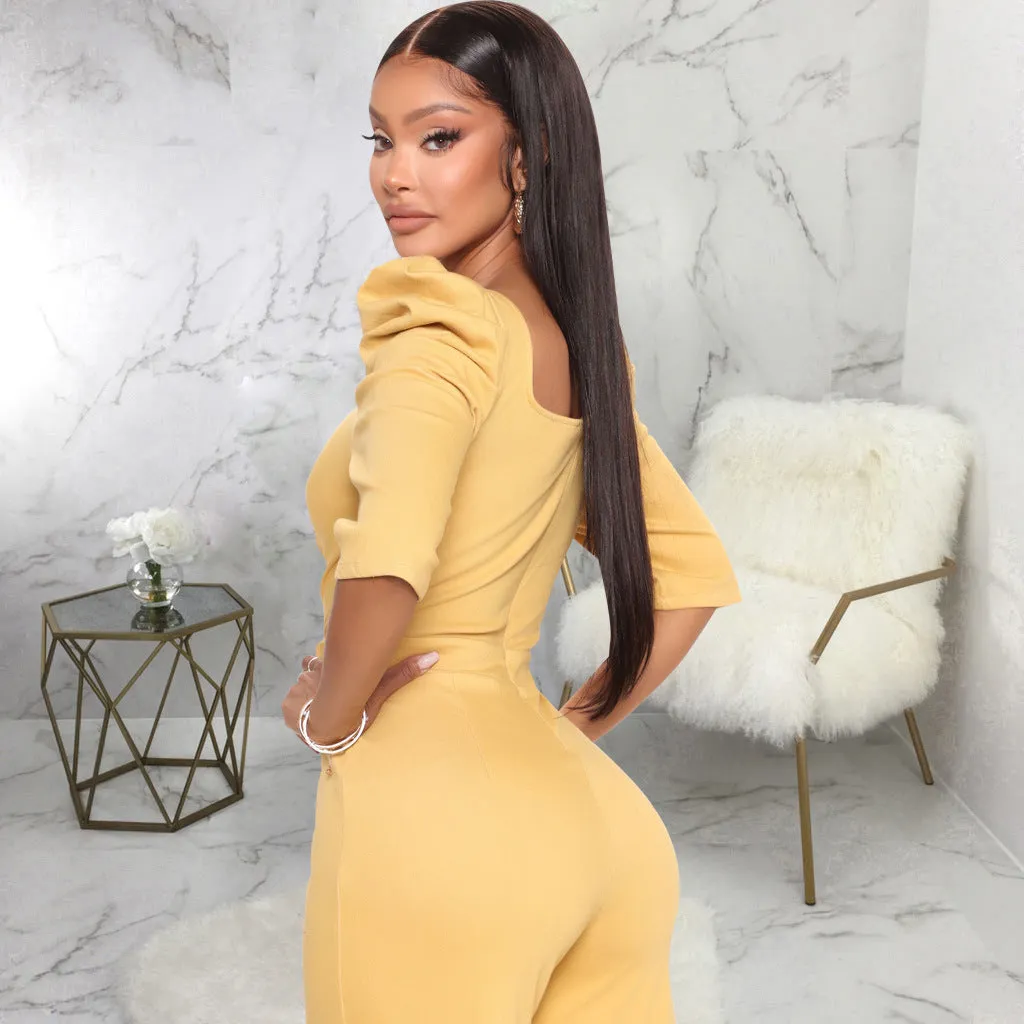 Chic Allure V-Neck Jumpsuit with Flattering Three-Quarter Sleeves